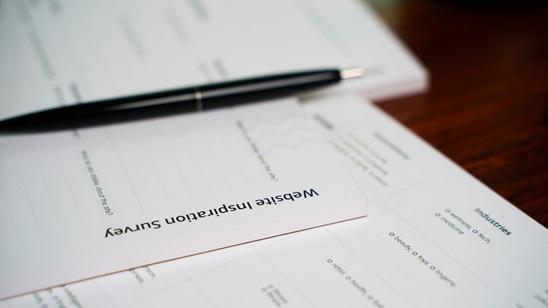 Paperwork and pen on a professional desk