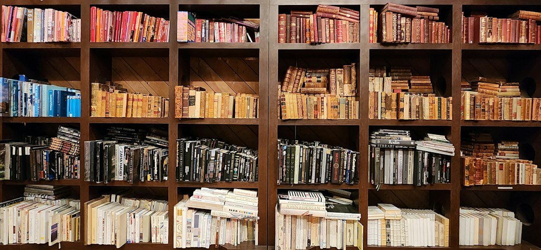 Books arranged on shelves in a reference library
